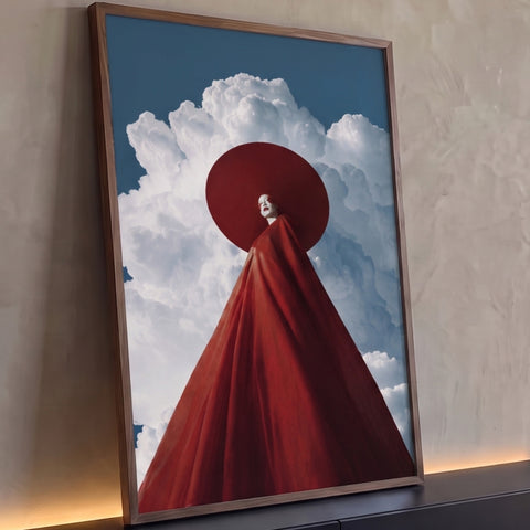 Quadro Decorativo Grande Figura em Manto para Sala Vermelho | quadros decorativos para sala | figura com manto vermelho e halo circular contra céu de nuvens brancas | Porao dos Quadros