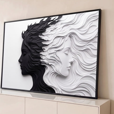 Dois perfis femininos, um preto e um branco, com cabelos ondulados em camadas de papel recortado, quadro decorativo