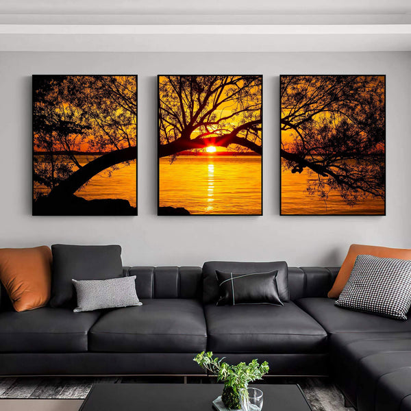 quadros decorativos para quartos com pôr do sol e árvores em tons quentes