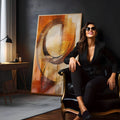 Abstrato com anéis marrons sobrepostos em fundo laranja e creme geométrico, quadro decorativo