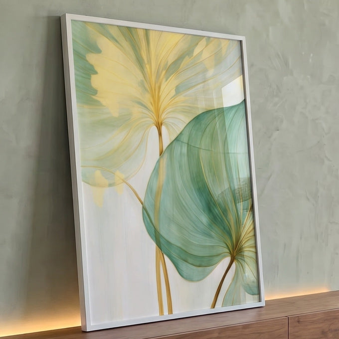 Folhas verde e amarela com hastes douradas em aquarela sobre fundo creme, quadro decorativo