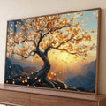 Árvore de tronco retorcido e folhas douradas com sol entre montanhas azuis, quadro decorativo