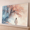 Jesus de túnica branca caminhando rumo à luz sob árvore de flores rosa em tons azuis, quadro decorativo
