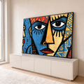 Quadro Decorativo Grande Rosto Cubista Azul para Sala | quadros decorativos para sala | rosto cubista dividido em azul e laranja com padrões tribais coloridos ao fundo | em Quadros para Sala | Porao dos Quadros
