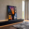 Árvore seca em primeiro plano, pôr do sol laranja, lua crescente e céu azul com nuvens, quadro decorativo