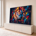 Quadro Decorativo Grande Leão para Sala Preto | quadros decorativos para sala | leão de frente com juba dourada e respingos de tinta colorida sobre fundo preto | em Quadros para Sala | Porao dos Quadros