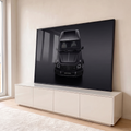 Quadro Decorativo Grande SUV Visto de Cima para Sala Preto | quadros decorativos para sala | SUV preto fosco visto de cima com faróis redondos acesos em fundo escuro | em Quadros para Sala | Porao dos Quadros