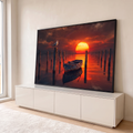 Quadro Decorativo Grande Pôr do Sol Gaivota para Sala | quadros decorativos para sala | gaivota em poste de madeira com barco e pôr do sol vermelho ao fundo | em Quadros para Sala | Porao dos Quadros