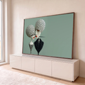 Quadro Decorativo Grande Figuras Surreais para Sala Verde | quadros decorativos para sala | duas figuras com cabeças de bolinhas pretas unidas por palito na boca, fundo verde | em Quadros para Sala | Porao dos Quadros