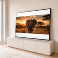 Elefante africano de frente no capim dourado da savana ao pôr do sol, acácias ao fundo, quadro decorativo
