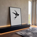Quadro Decorativo Andorinha em Voo Efeito Spray Preto | quadros decorativos para sala | silhueta preta de andorinha em voo com efeito de partículas sobre fundo branco | em Quadros para Sala | Porao dos Quadros