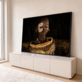 Quadro Decorativo Grande Criança Africana para Sala Marrom | quadros decorativos para sala | criança africana com pintura facial branca e colar de conchas sobre fundo escuro | em Quadros para Sala | Porao dos Quadros
