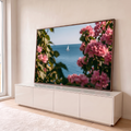 Quadro Decorativo Grande Veleiro no Mar Azul para Sala | quadros decorativos para sala | veleiro branco no mar azul visto através de flores rosa desfocadas em primeiro plano | em Quadros para Sala | Porao dos Quadros
