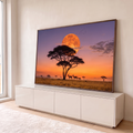 Quadro Decorativo Grande Lua Gigante para Sala Laranja | quadros decorativos para sala | lua laranja gigante atrás de acácia com antílopes caminhando na savana ao entardecer | em Quadros para Sala | Porao dos Quadros