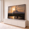Quadro Decorativo Grande Veados na Lagoa para Sala Laranja | quadros decorativos para sala | veados silhuetados bebendo água numa lagoa ao pôr do sol com raios de luz | em Quadros para Sala | Porao dos Quadros