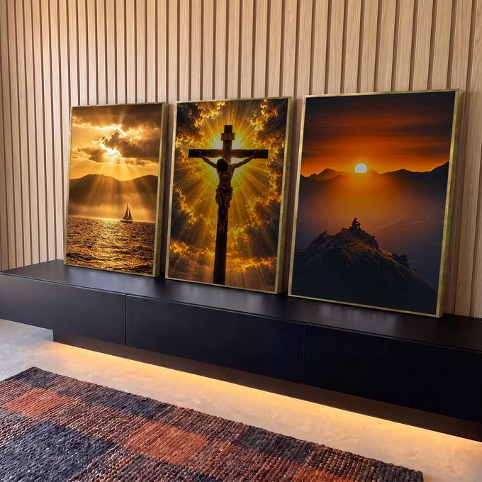 Quadro Decorativo Kit 3 Telas Cristo na Cruz para Sala | quadros decorativos para sala | tríptico com Cristo crucificado ao centro, veleiro e pessoa no cume ao pôr do sol | em Quadros para Sala | Porao dos Quadros
