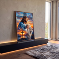 Quadro Decorativo Grande Jesus com Leão Laranja para Sala | quadros decorativos para sala | homem de manto azul com a mão sobre leão branco diante de pôr do sol e cruz | em Quadros para Sala | Porao dos Quadros