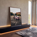 Quadro Decorativo Grande Carro Esportivo para Sala Vermelho | quadros decorativos para sala | carro esportivo vinho rebaixado estacionado em pátio molhado com casas ao fundo | em Quadros para Sala | Porao dos Quadros
