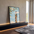 Quadro Decorativo Grande Menino com Maçã para Sala Azul | quadros decorativos para sala | menino equilibrado sobre pilha de livros coloridos segurando uma maçã vermelha | em Quadros para Sala | Porao dos Quadros
