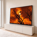 Quadro Decorativo Grande Ave em Galho Seco para Sala Laranja | quadros decorativos para sala | silhueta de ave em galho seco contra céu laranja intenso ao pôr do sol | em Quadros para Sala | Porao dos Quadros