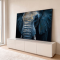 Quadro Decorativo Grande Elefante em Close para Sala Azul | quadros decorativos para sala | close da cabeça de elefante com pele rachada e poeira dourada sobre tom azulado | em Quadros para Sala | Porao dos Quadros