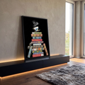 Quadro Decorativo Grande Pilha de Livros para Sala Dourado | quadros decorativos para sala | pilha de livros coloridos com xícara de chá florida e fumaça em forma de coração | em Quadros para Sala | Porao dos Quadros