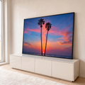 Quadro Decorativo Grande Duas Palmeiras Laranja para Sala | quadros decorativos para sala | silhueta de duas palmeiras com pôr do sol laranja e rosa sobre o mar | em Quadros para Sala | Porao dos Quadros