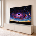 Quadro Decorativo Grande Buraco Negro para Sala Preto | quadros decorativos para sala | buraco negro com espiral de luz colorida e silhueta de pessoa observando | em Quadros para Sala | Porao dos Quadros