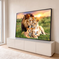 Quadro Decorativo Grande Família de Leões Laranja para Sala | quadros decorativos para sala | leão, leoa e filhote deitados juntos na grama ao pôr do sol | em Quadros para Sala | Porao dos Quadros