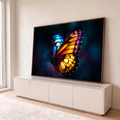Quadro Decorativo Grande Borboleta com Asas para Sala | quadros decorativos para sala | borboleta com asa laranja e roxa de um lado e asa azul turquesa do outro, fundo escuro | em Quadros para Sala | Porao dos Quadros