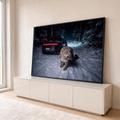 Quadro Decorativo Grande Leopardo das Neves Preto para Sala | quadros decorativos para sala | leopardo das neves caminhando em estrada nevada à noite com carro ao fundo | em Quadros para Sala | Porao dos Quadros