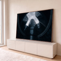 Prédios de vidro curvos em espiral vistos de baixo sob céu nublado, em tons azul-escuros, quadro decorativo