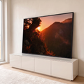 Quadro Decorativo Grande Pôr do Sol Montanha para Sala | quadros decorativos para sala | pôr do sol dourado entre pinheiros e rochas com montanhas ao fundo e céu rosado | em Quadros para Sala | Porao dos Quadros