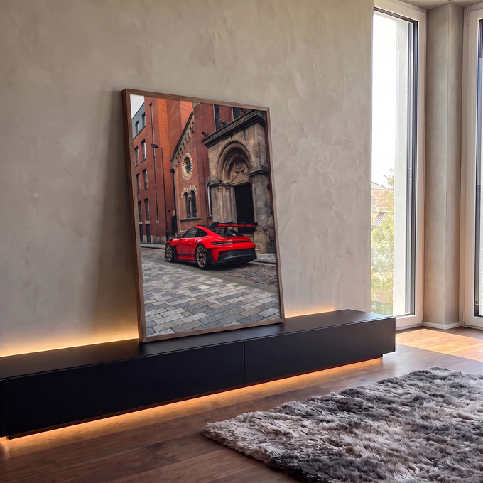 Quadro Decorativo Grande Esportivo para Sala | quadros decorativos para sala | carro esportivo vermelho com aerofólio em rua de paralelepípedos frente a igreja de tijolos | em Quadros para Sala | Porao dos Quadros