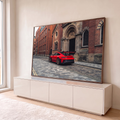 Quadro Decorativo Grande GT3 RS Vermelha para Sala Vermelho | quadros decorativos para sala | carro esportivo vermelho com aerofólio preto estacionado em rua de tijolos | em Quadros para Sala | Porao dos Quadros