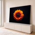 Quadro Decorativo Grande Flor com Gotas de Água para Sala | quadros decorativos para sala | flor laranja em macro com gotas de água e reflexo sobre fundo preto | em Quadros para Sala | Porao dos Quadros