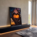 Quadro Decorativo Grande Árvore para Sala Laranja | quadros decorativos para sala | galhos de árvore formando coração emoldurando pôr do sol sobre montanhas | em Quadros para Sala | Porao dos Quadros