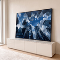 Pintura de arranha-céus espelhados vistos de baixo refletindo céu azul e nuvens, quadro decorativo
