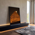 Quadro Decorativo Grande Pirâmide Dourada para Sala Laranja | quadros decorativos para sala | pirâmide dourada com lua cheia e camelos em silhueta no deserto à noite | em Quadros para Sala | Porao dos Quadros