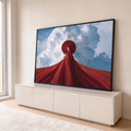 Quadro Decorativo Grande Mulher de Capa para Sala Vermelho | quadros decorativos para sala | figura com rosto branco e capa vermelha diante de nuvens volumosas no céu azul | em Quadros para Sala | Porao dos Quadros