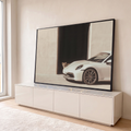 Quadro Decorativo Grande Carro Esportivo para Sala Branco | quadros decorativos para sala | carro esportivo branco estacionado com filhote de leão espiando de uma porta escura | em Quadros para Sala | Porao dos Quadros