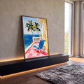 Quadro Decorativo Varanda Tropical com e Mar Azul | quadros decorativos para sala | varanda amarela com cadeira azul, piso rosa, e mar ao fundo | em Quadros para Sala | Porao dos Quadros