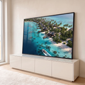 Vista aérea de praia tropical com bangalôs de palha, coqueiros, lancha e mar turquesa, quadro decorativo