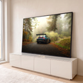 Quadro Decorativo Grande Carro Esportivo Floresta para Sala | quadros decorativos para sala | carro esportivo azul visto de trás em estrada enevoada dentro de floresta | em Quadros para Sala | Porao dos Quadros