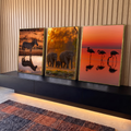 Quadro Decorativo Kit 3 Telas Safari ao Pôr do Sol para Sala | quadros decorativos para sala | tríptico com zebra, elefantes e flamingos silhuetados ao pôr do sol dourado | em Quadros para Sala | Porao dos Quadros