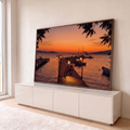 Quadro Decorativo Grande Píer ao Pôr do Sol para Sala | quadros decorativos para sala | píer de madeira com bicicleta e lampiões acesos ao pôr do sol laranja | em Quadros para Sala | Porao dos Quadros