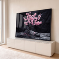 Bonsai de cerejeira com flores rosa sobre rochas negras e fundo preto, estilo japonês, quadro decorativo