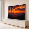 Quadro Decorativo Grande Pôr do Sol Montanhas para Sala | quadros decorativos para sala | pôr do sol laranja entre montanhas em silhueta com céu dramático | em Quadros para Sala | Porao dos Quadros