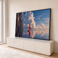 Quadro Decorativo Grande Veleiro Vermelho para Sala Azul | quadros decorativos para sala | veleiro de vela vermelha em água espelhada entre falésias e nuvem volumosa no céu azul | em Quadros para Sala | Porao dos Quadros