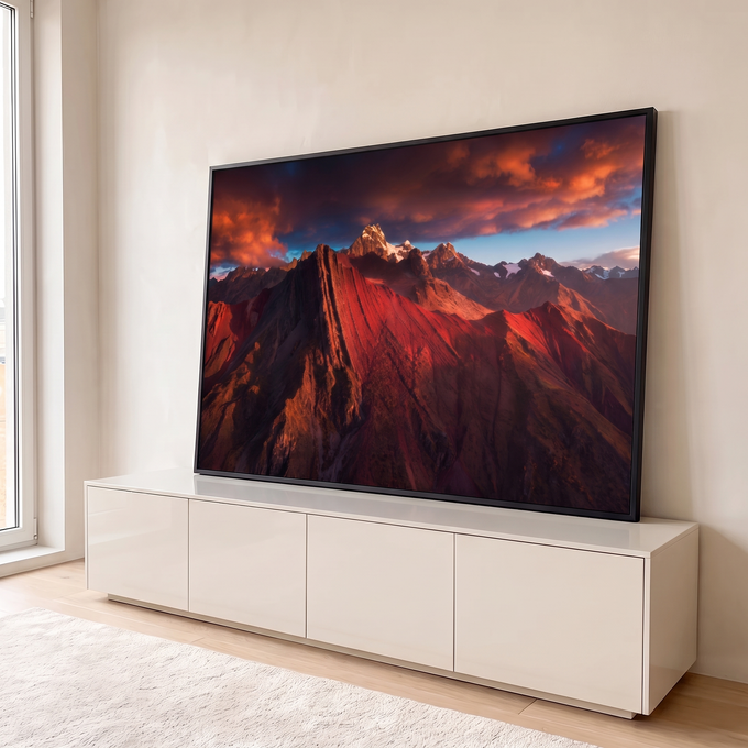 Cordilheira dos Andes vermelha com picos nevados sob céu de nuvens alaranjadas, quadro decorativo